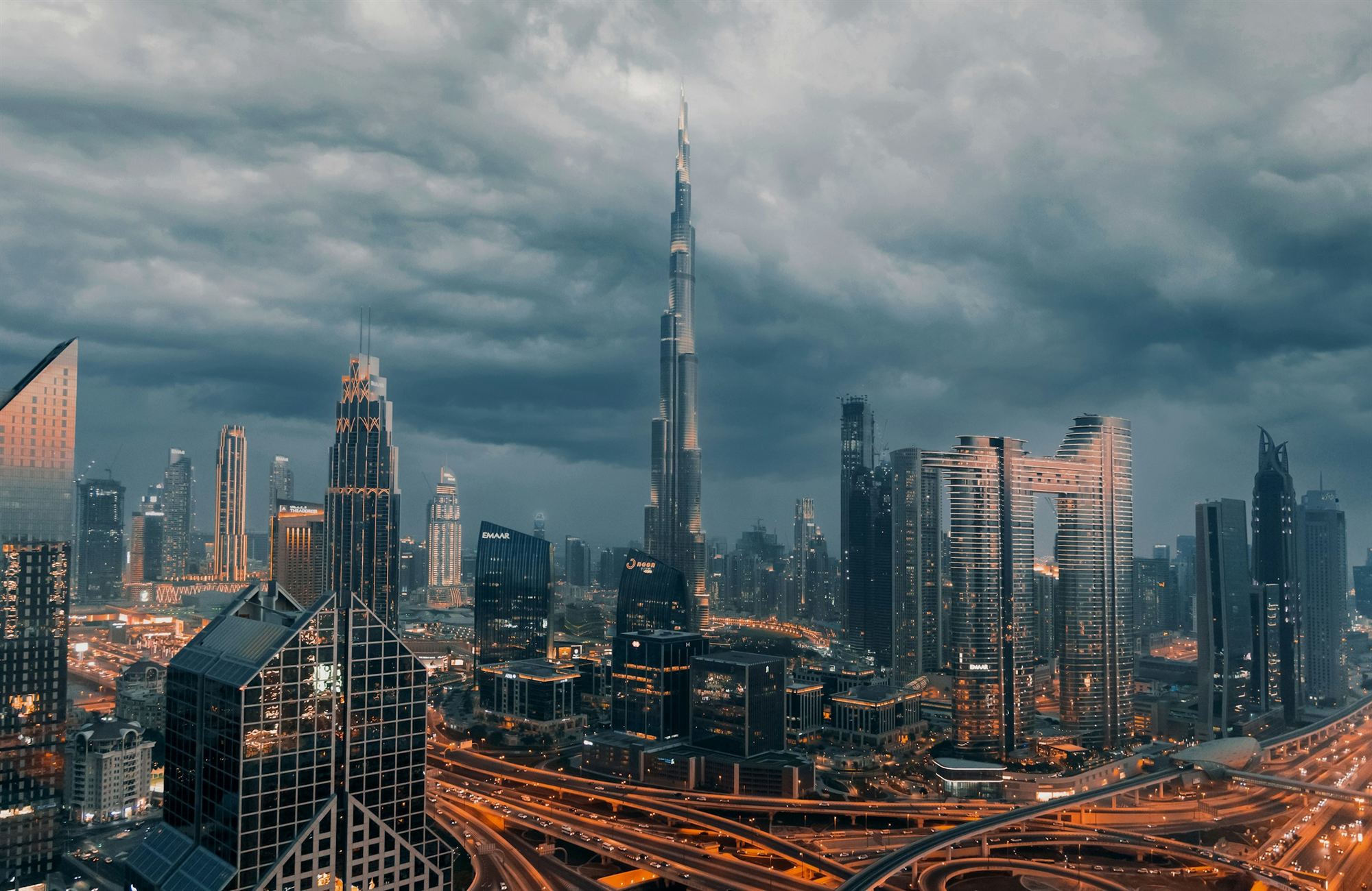 Downtown Dubai and the Burj Khalifa under a dramatic sky
